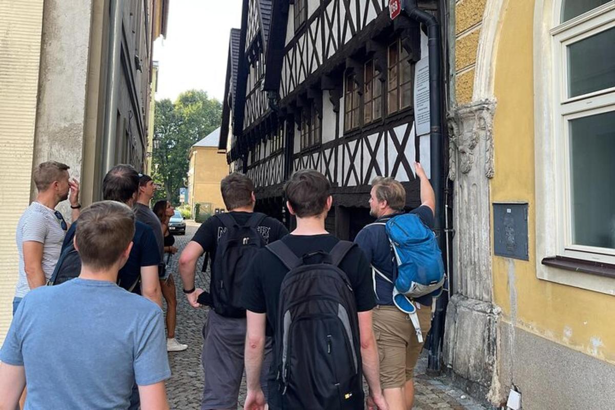 a group of people standing outside of a building