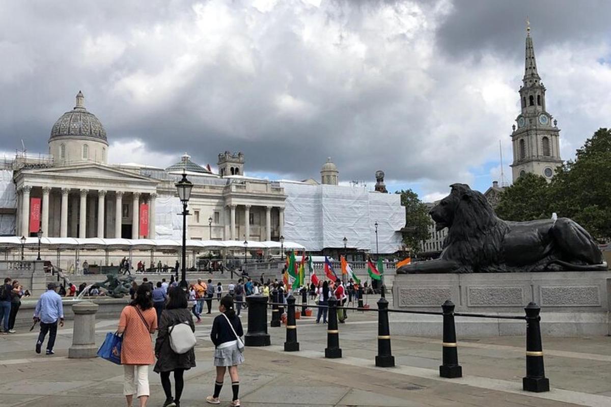 a statue of a lion in front of a building