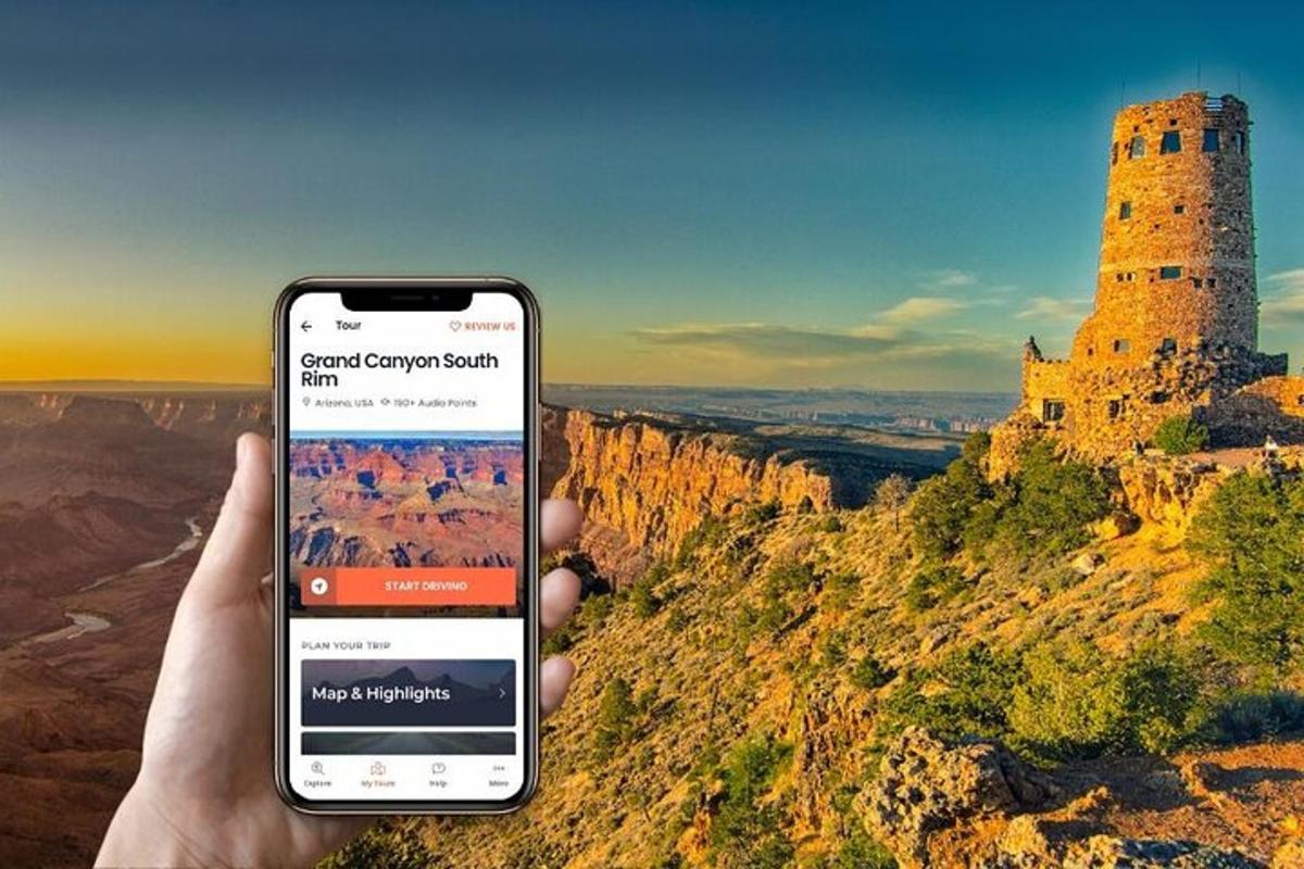 a person holding a cell phone in front of a castle