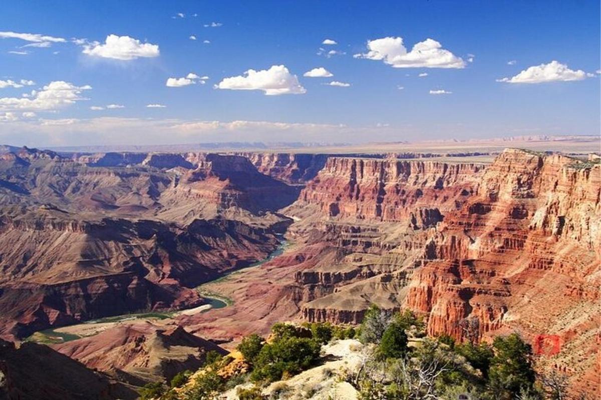 a view of the grand canyon on a sunny day
