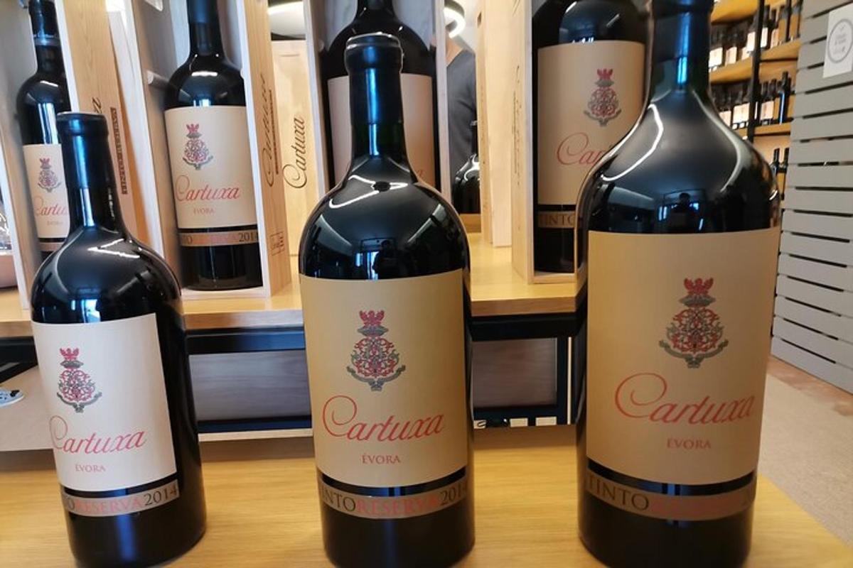 two bottles of wine sitting on a table