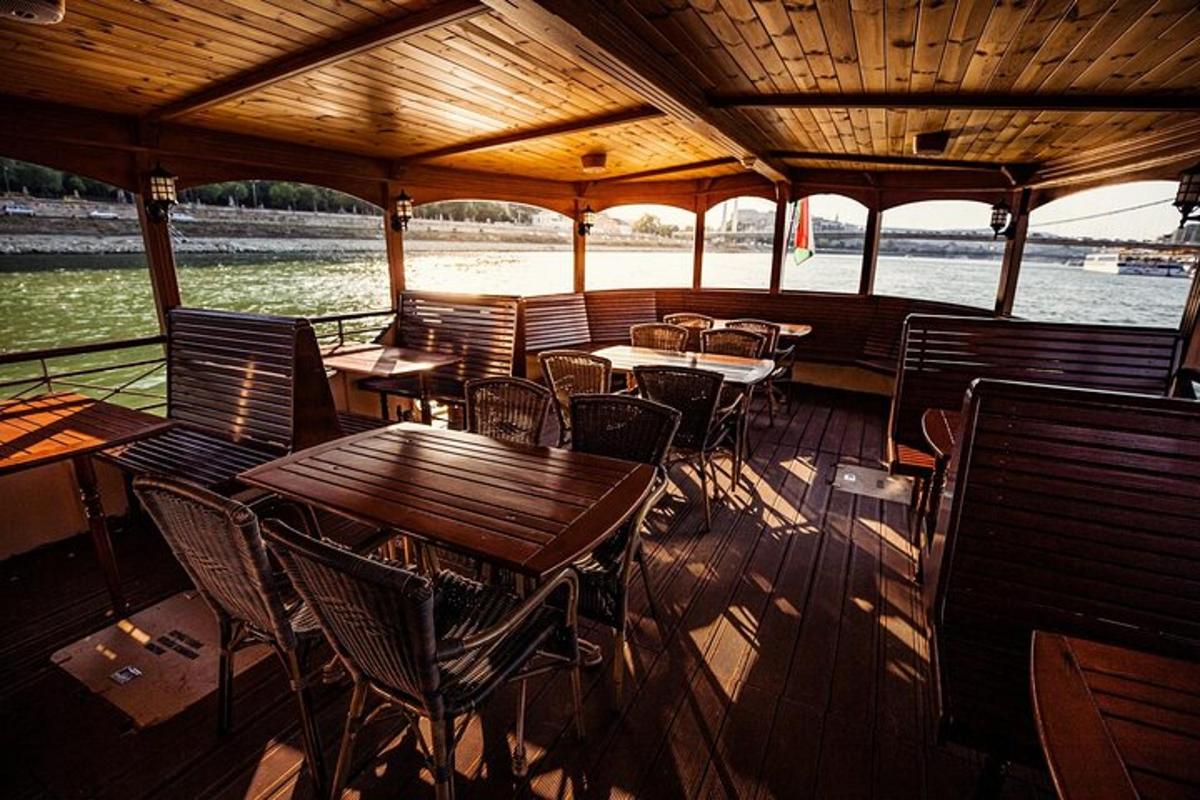 a restaurant with tables and chairs on a boat