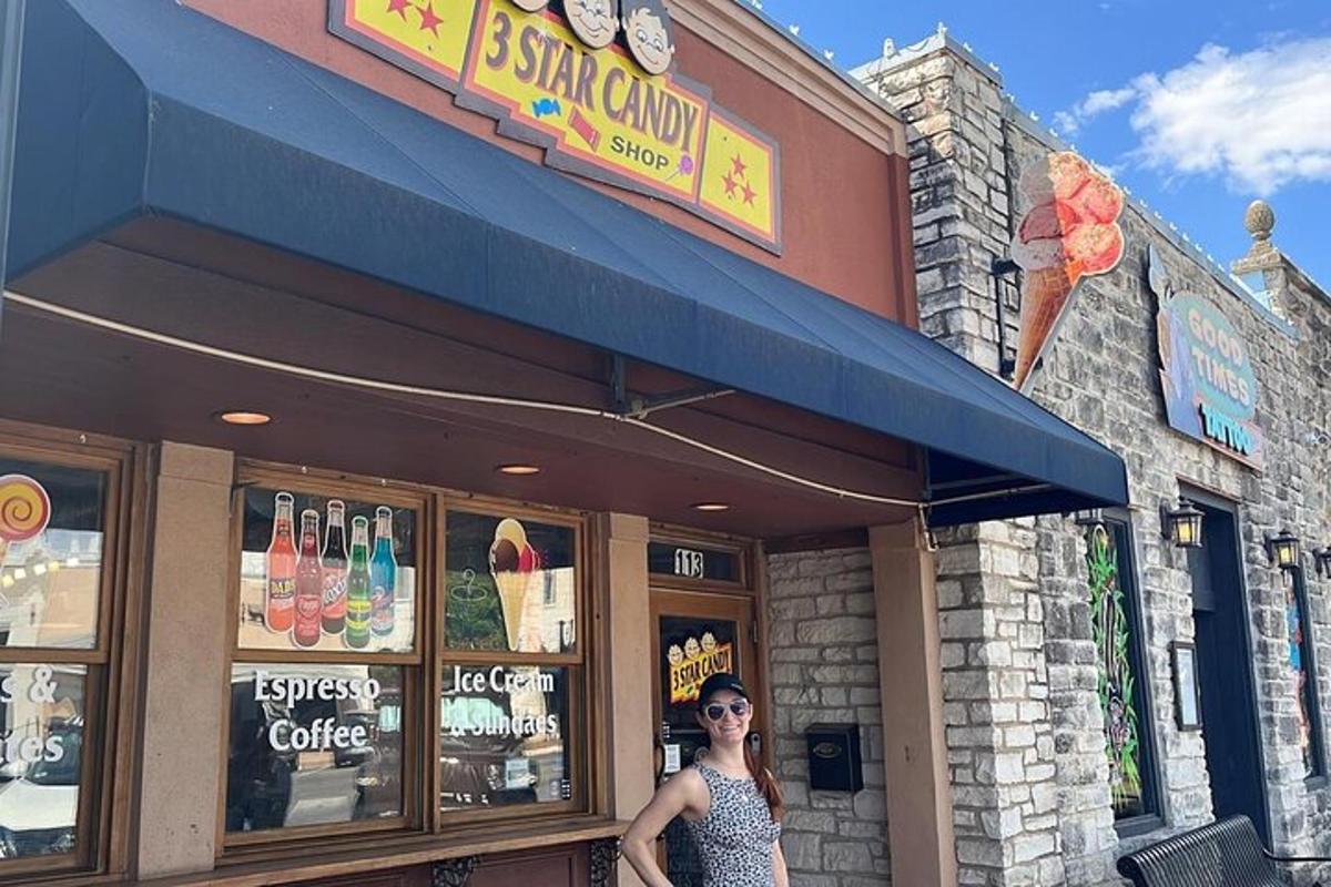 a woman standing in front of a restaurant
