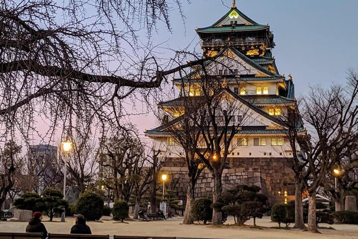 a large building with a tower in front of it