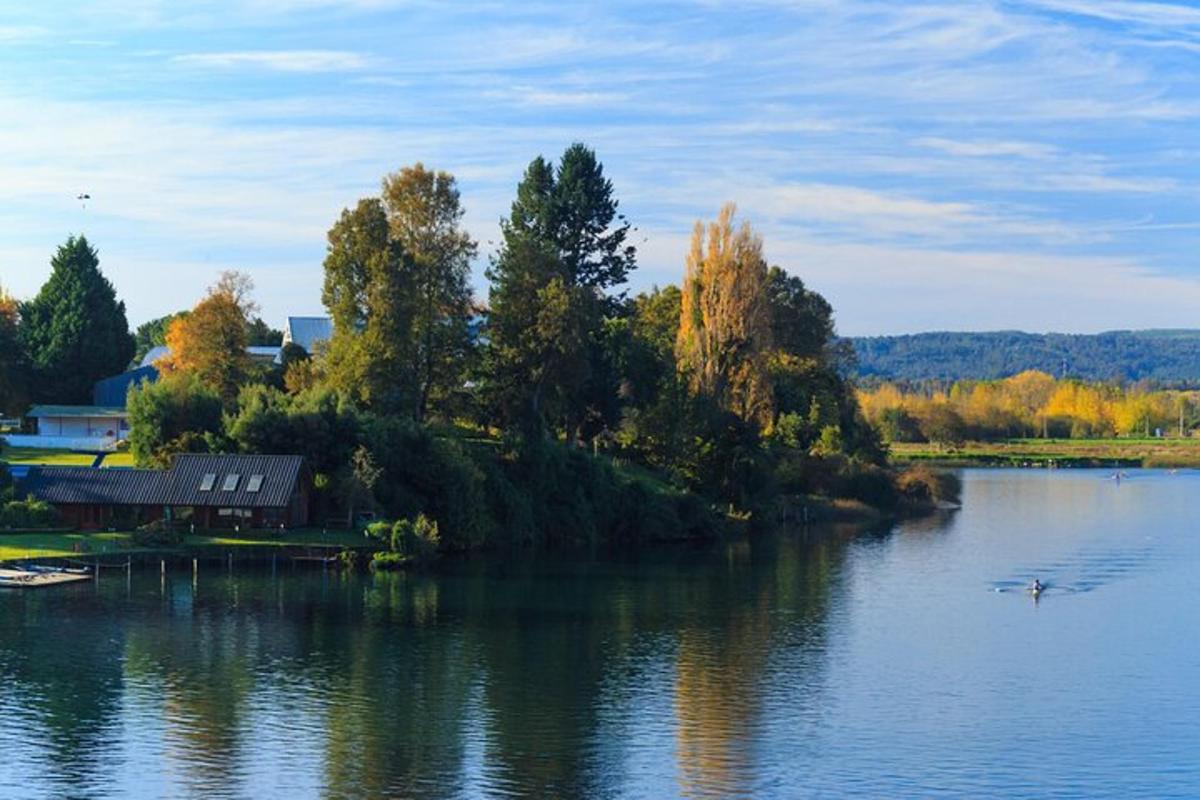 a house on an island in the middle of a lake