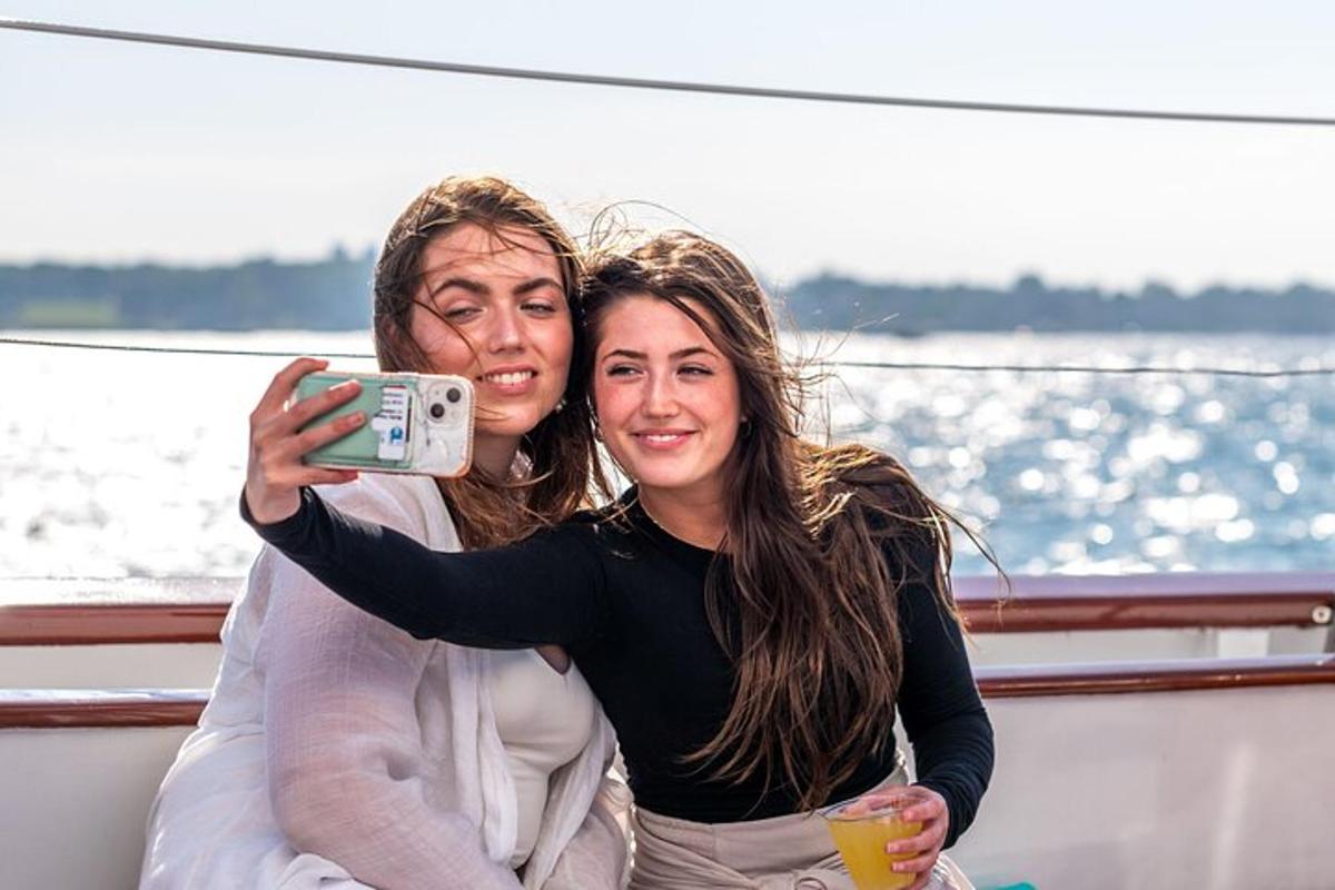 a man and a woman taking a picture on a boat