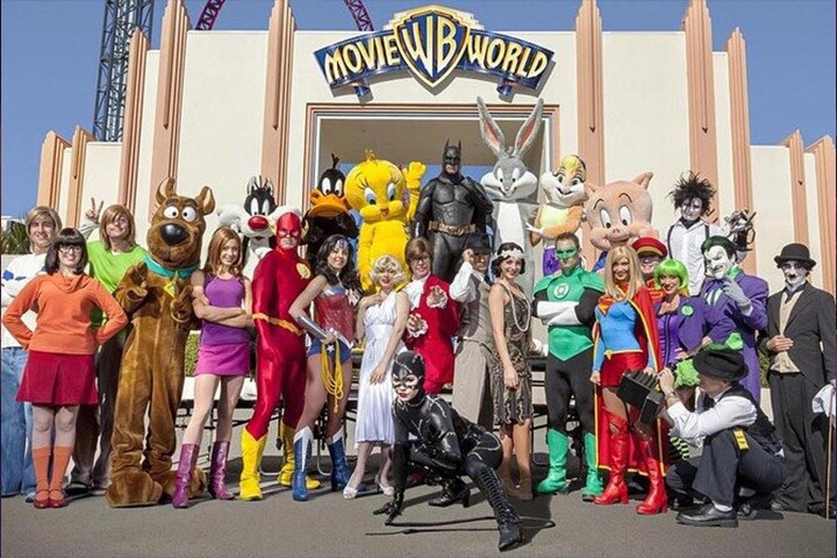 a group of people dressed in costumes posing for a picture