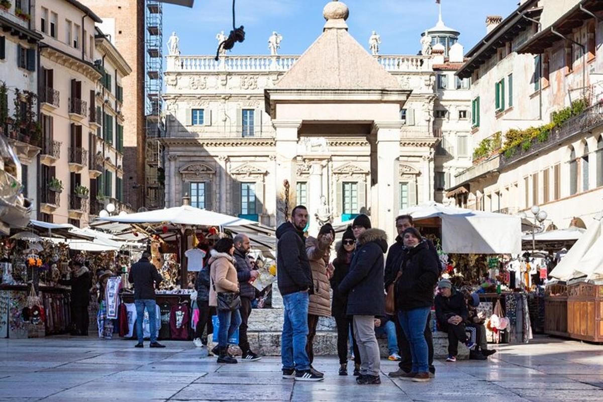 a group of people standing in a street market