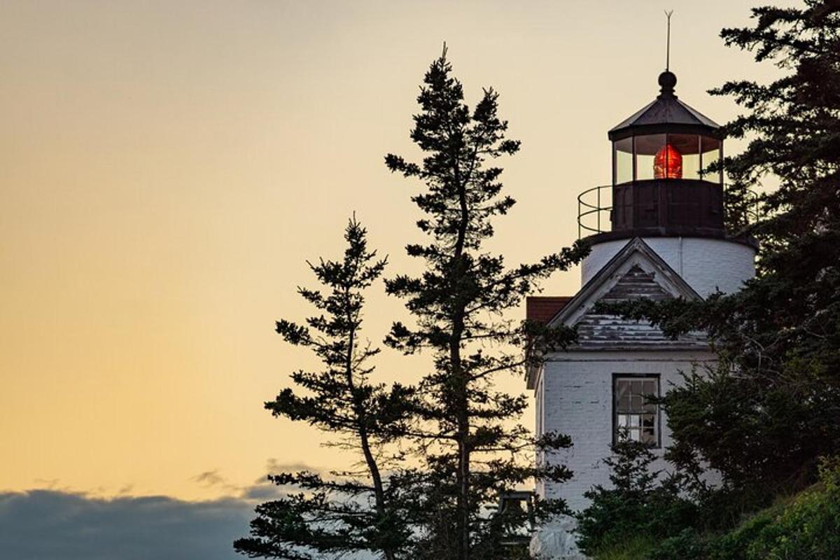 a lighthouse with a red light on top of it