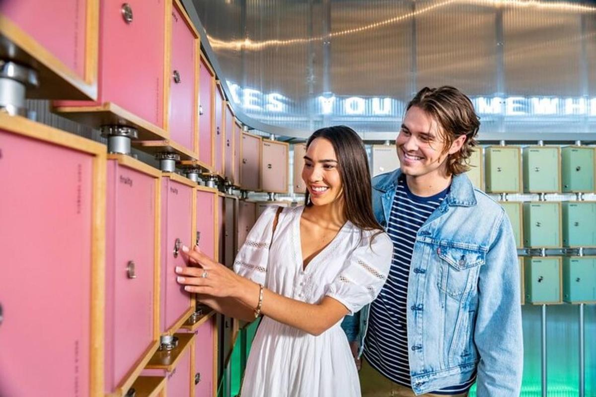 two women standing in front of lockers in a locker room