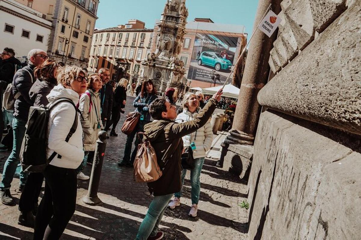 a man taking a picture of a crowd of people