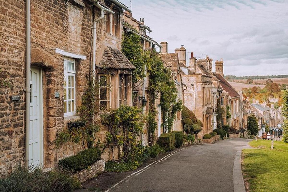 a street of old brick houses in a village