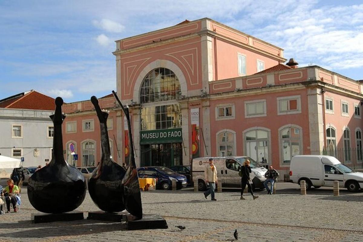 a large building with a statue in front of it