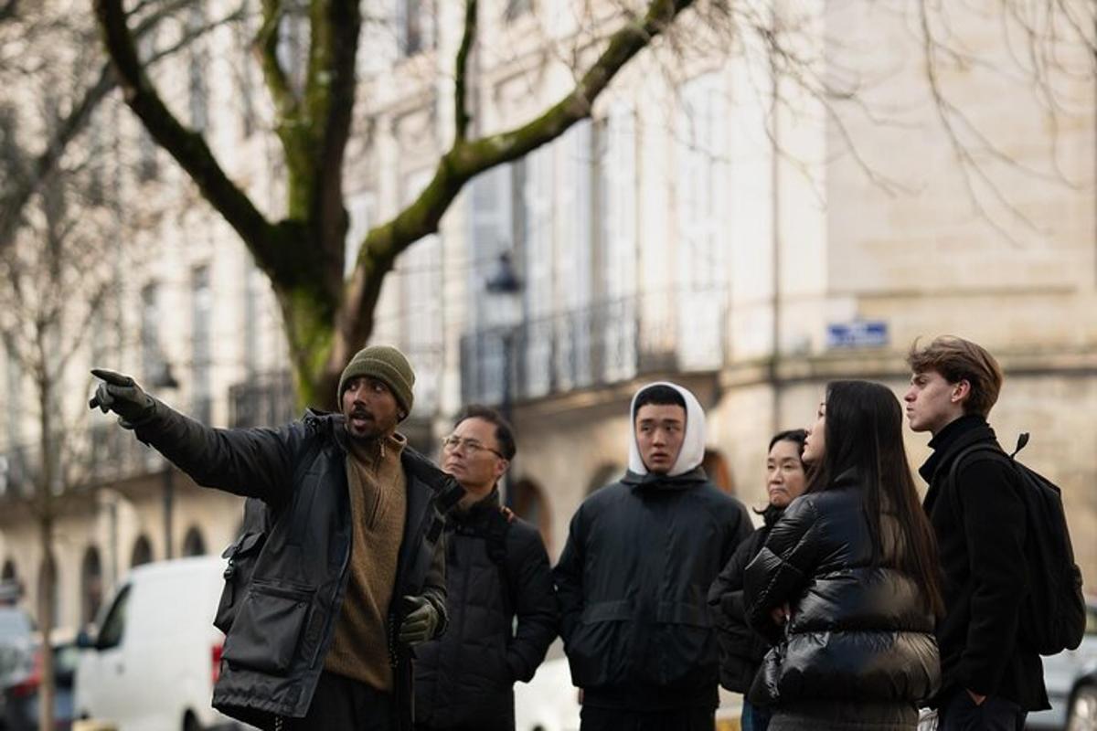 a group of people walking down a street