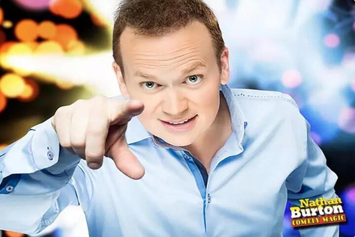 a man pointing his finger at the camera