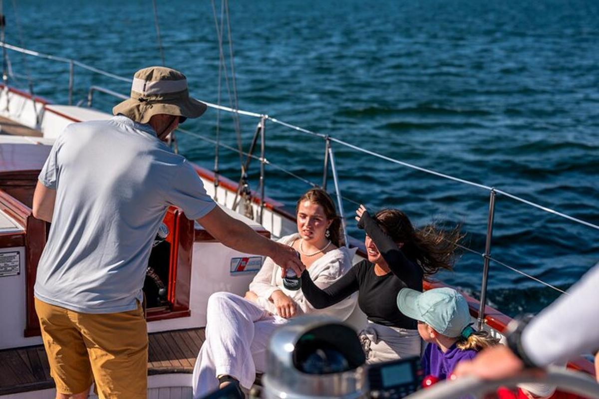 a group of people on a boat in the water