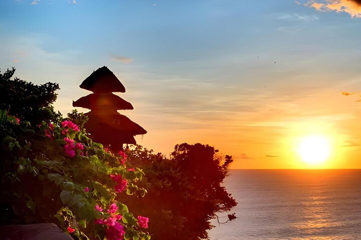 a view of the ocean with a sunset in the background