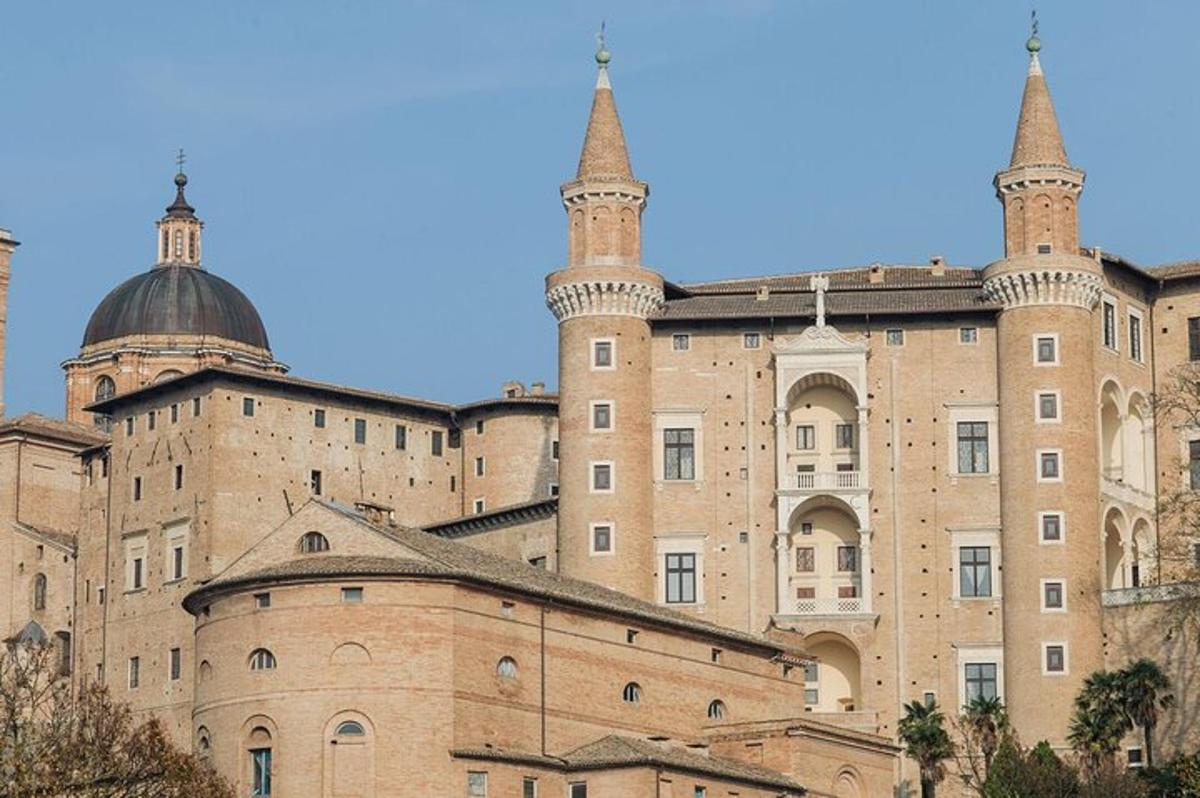 a large castle with two towers on top of it
