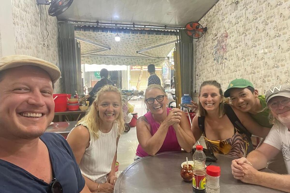 a group of people sitting at a table