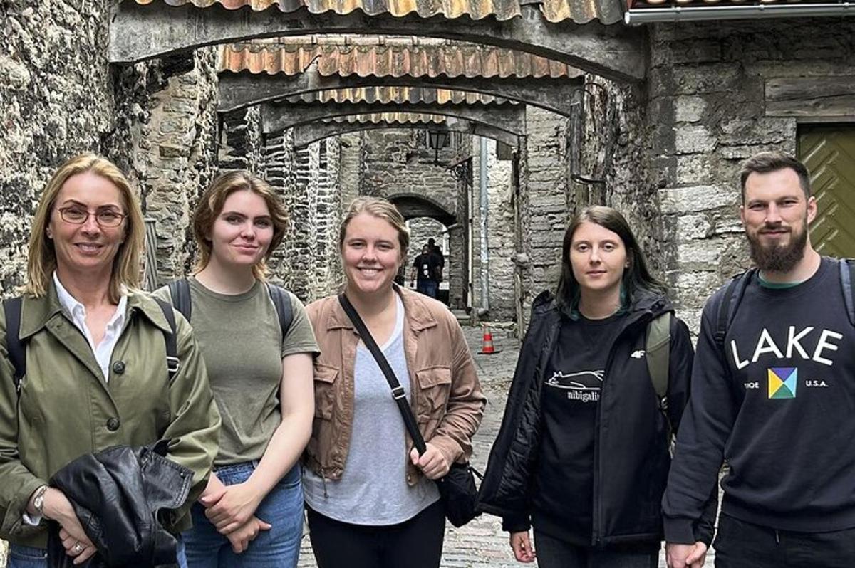 a group of people standing in front of a building
