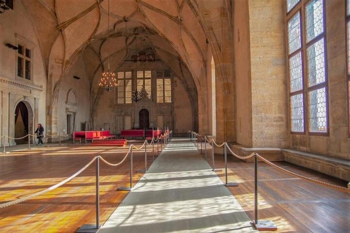 an empty church with a long aisle in it