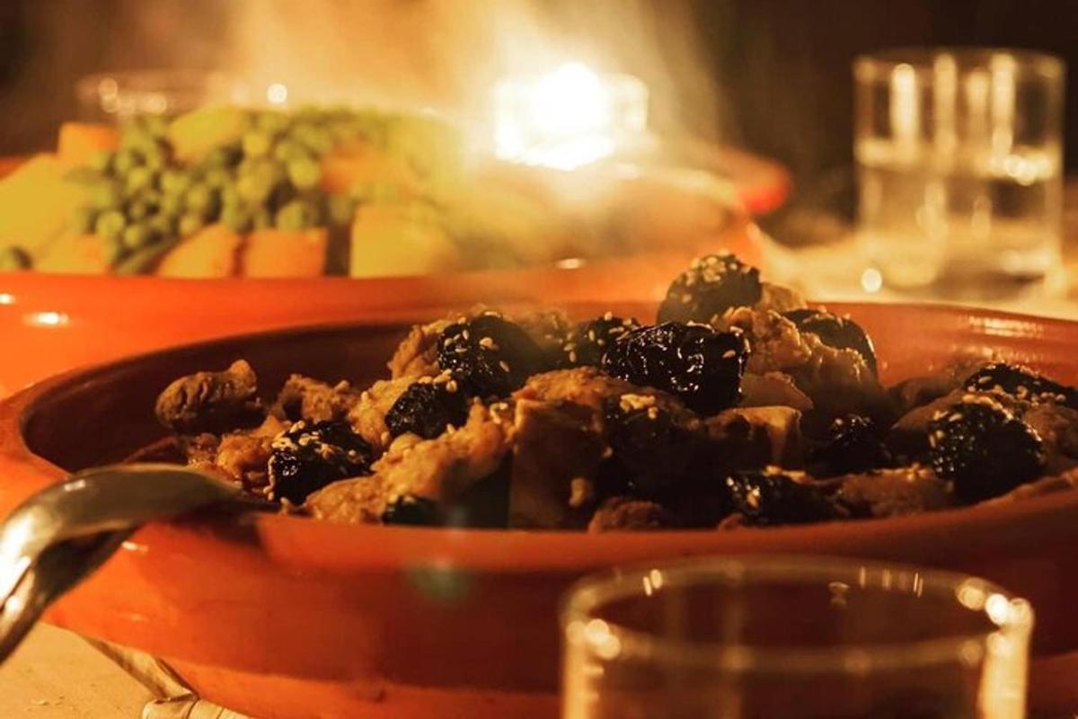 a dish of food in a red bowl on a table