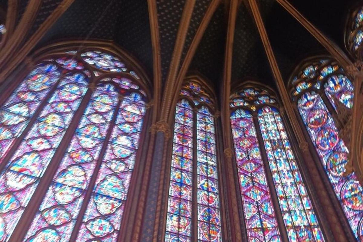 a group of stained glass windows in a church