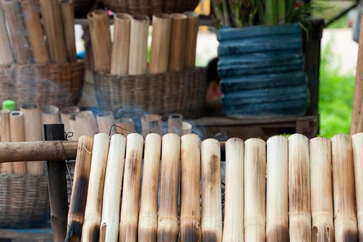a group of wooden vases and baskets on display