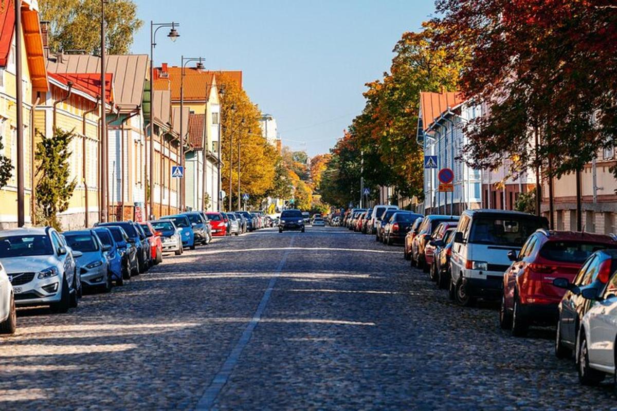 a street with cars parked on the side of a road