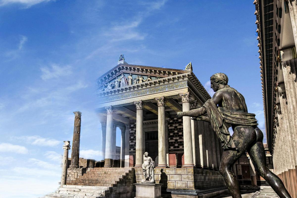 eine Statue eines Mannes vor einem Gebäude