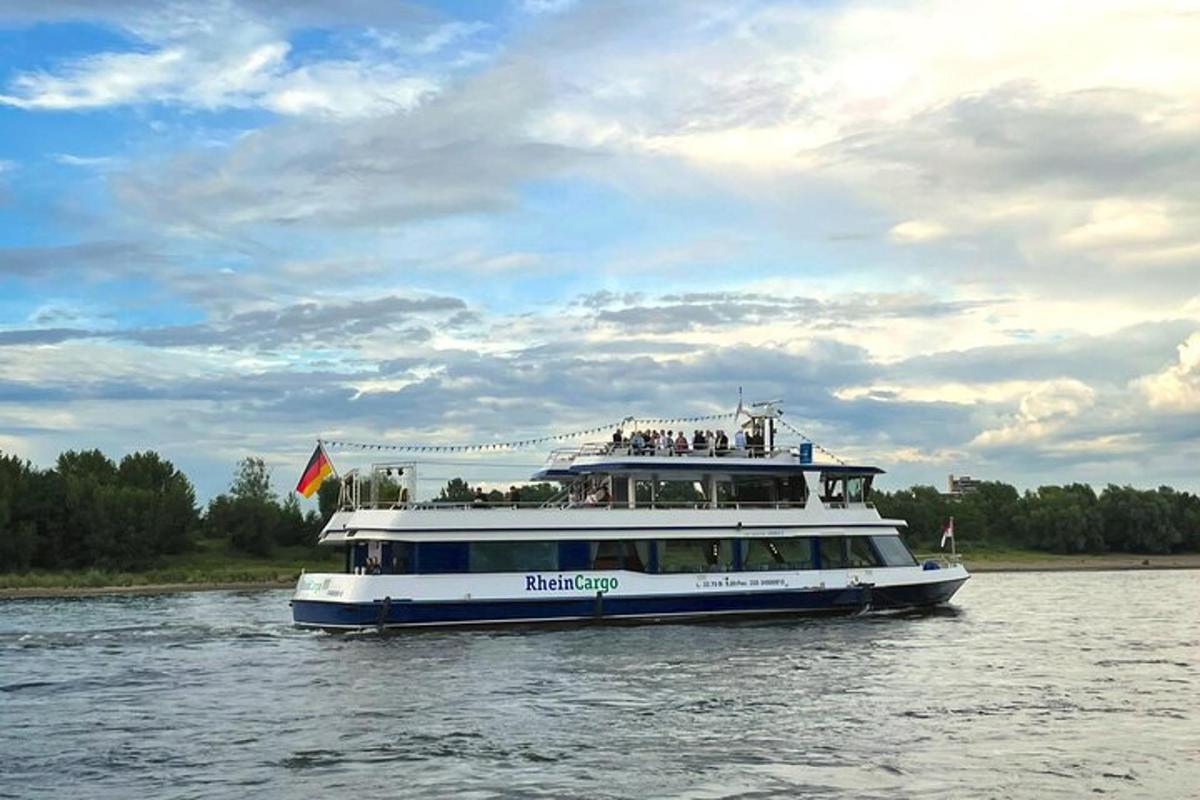 a boat on a river with people on it