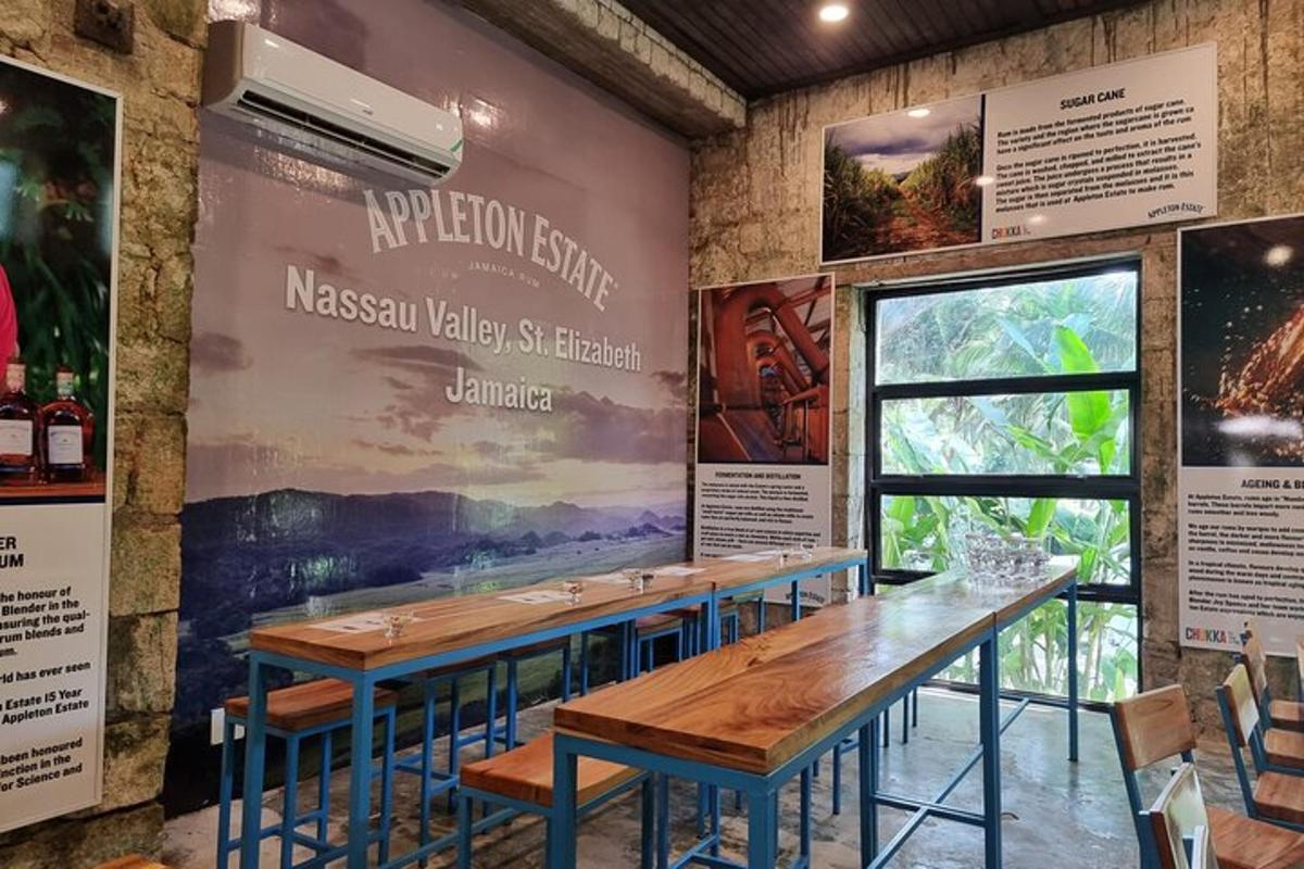 a dining room with tables and a wall with posters