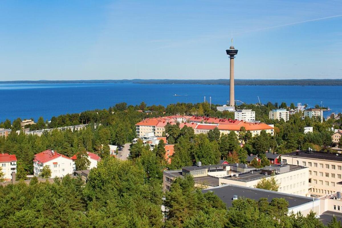 a city with a radio tower on top of it