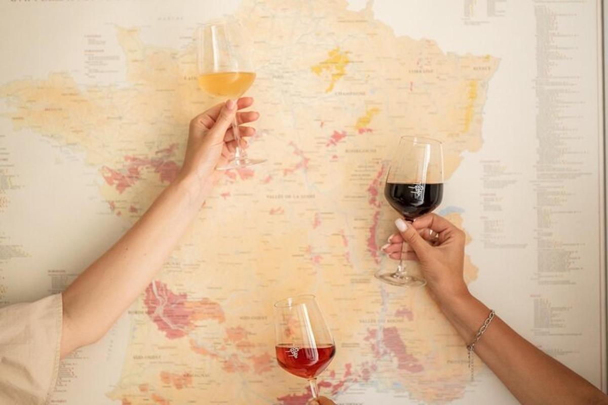 two people holding wine glasses in front of a map