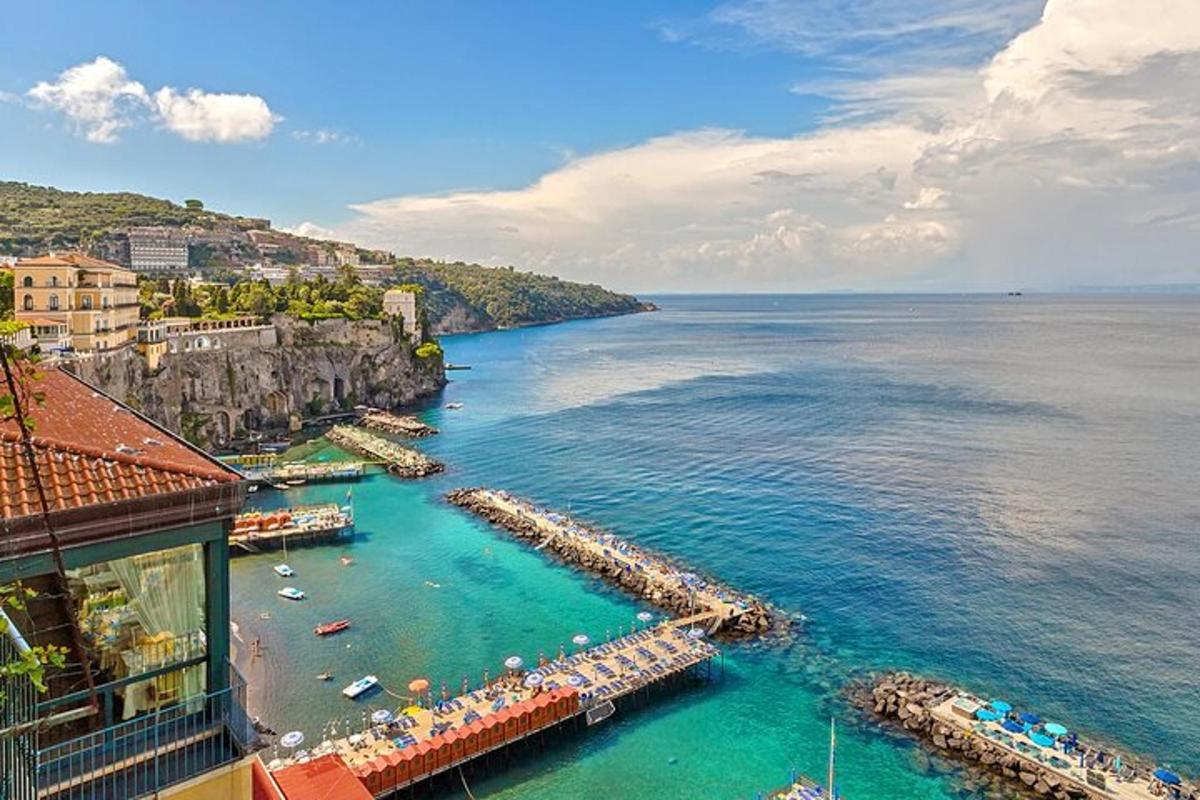a view of a beach with boats in the water