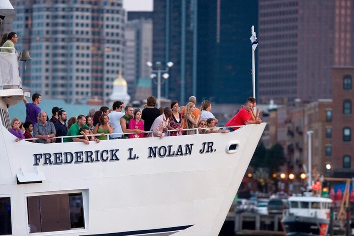 a group of people riding on the back of a boat
