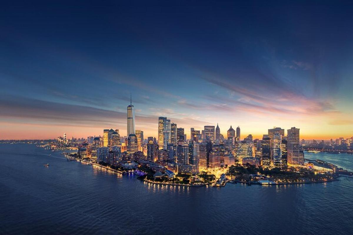 an aerial view of a large city at sunset