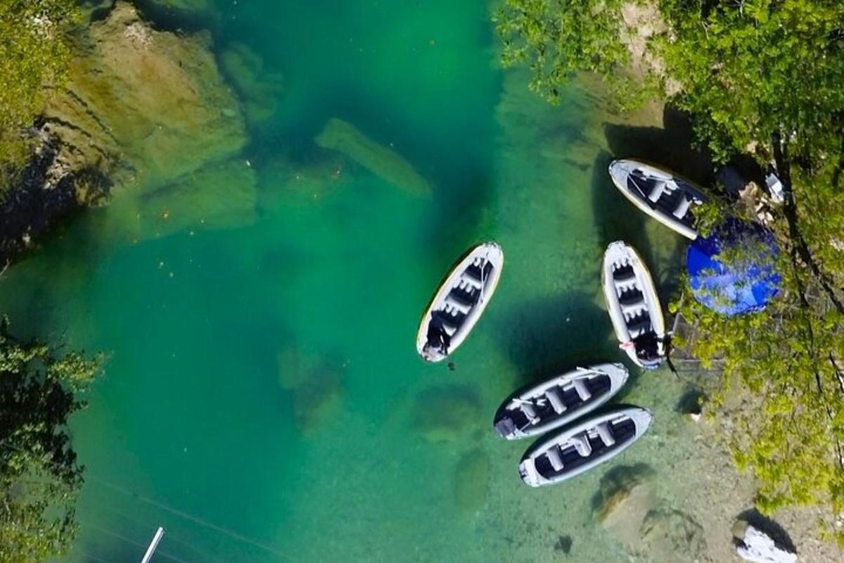 a group of boats parked in the water