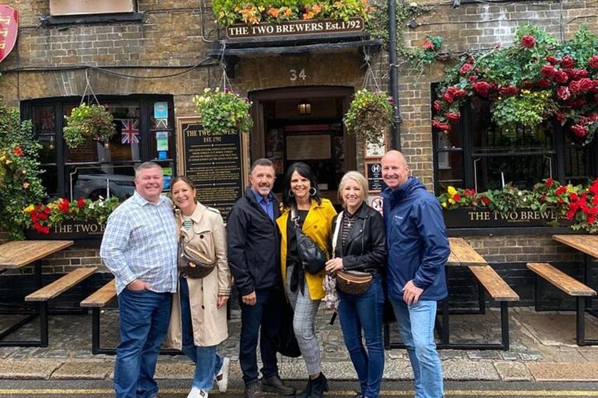 a group of people standing in front of a building
