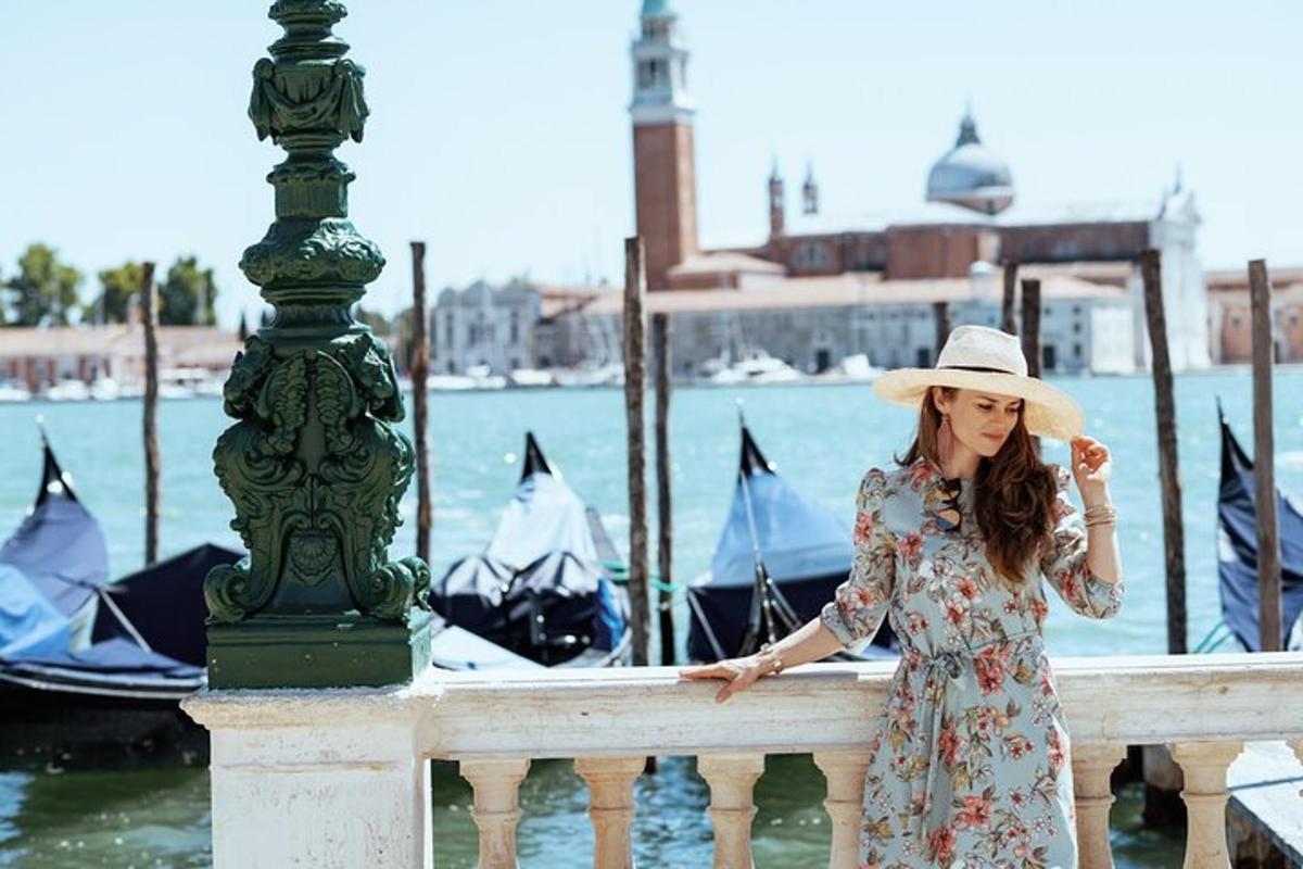 a woman in a dress and hat leaning on a railing
