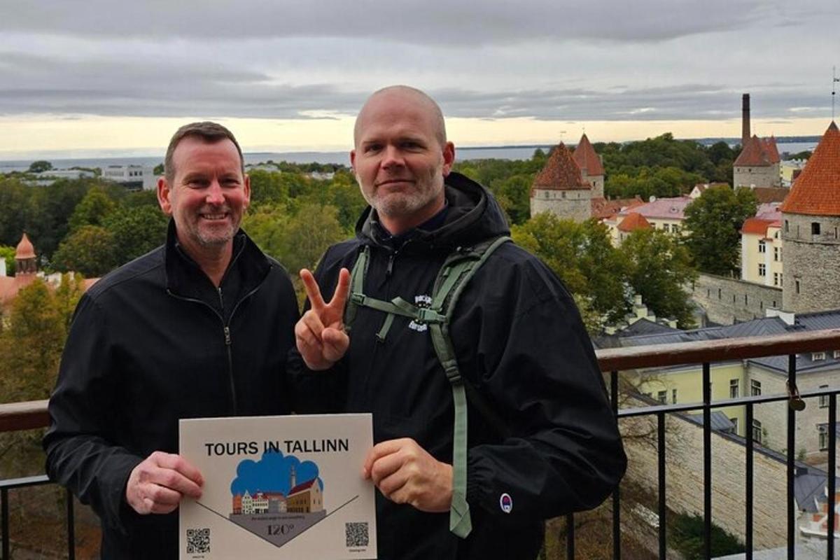 two men holding up a peace sign and a sign that says tours in halelin