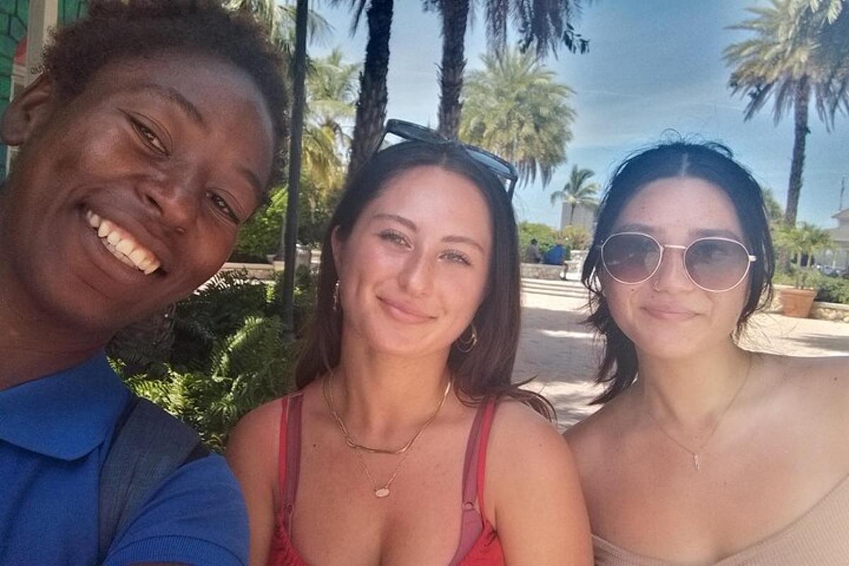 a man and two women posing for a picture