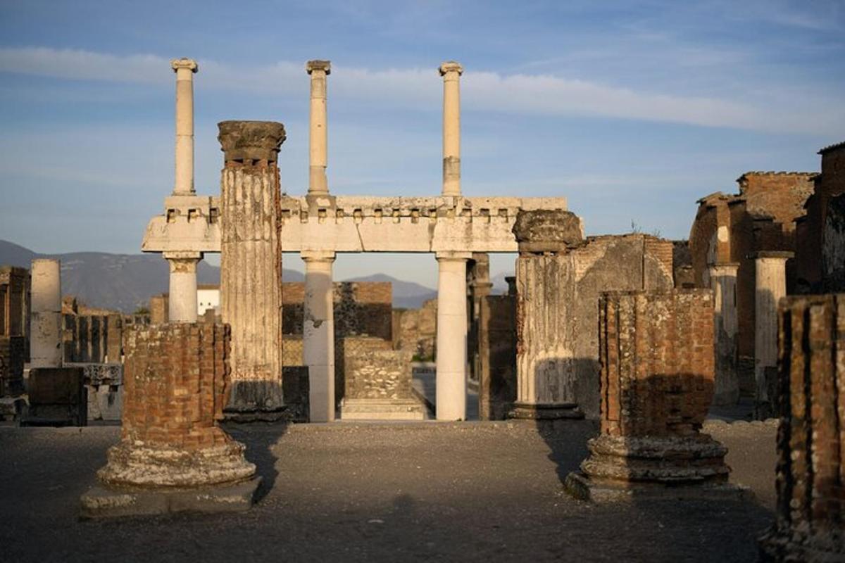 a view of an ancient building with columns