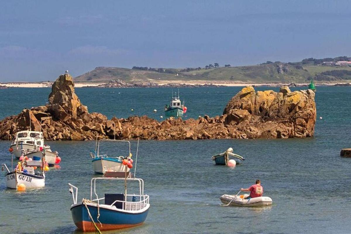 a group of boats floating in the water