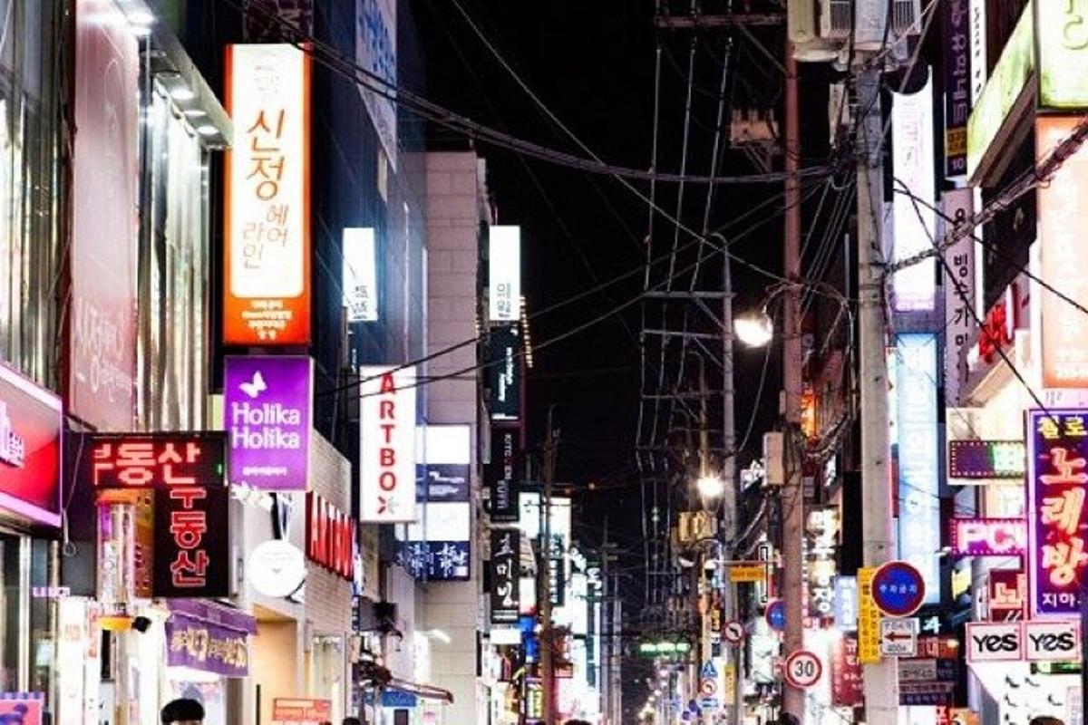a city street filled with lots of signs