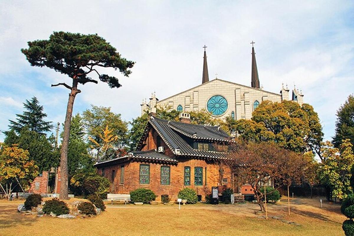 a church with a clock tower on top of it