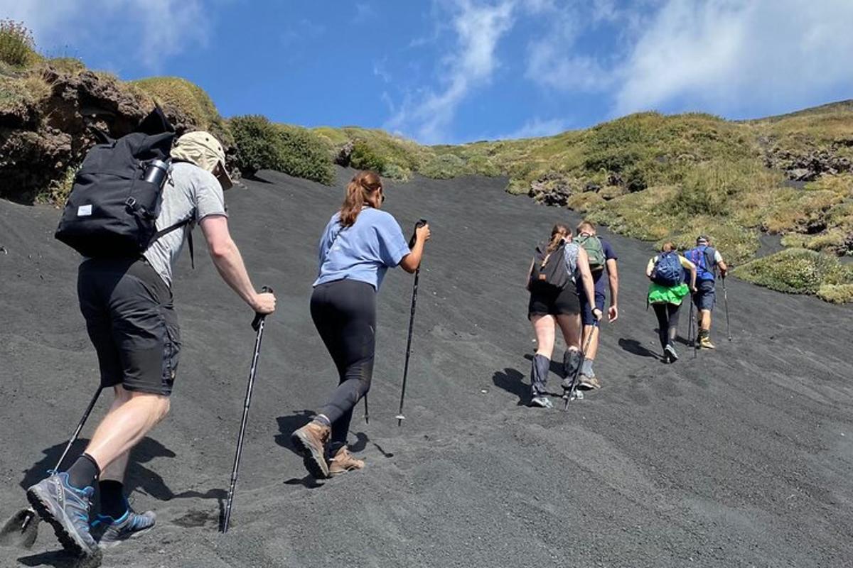 a group of people walking down a road