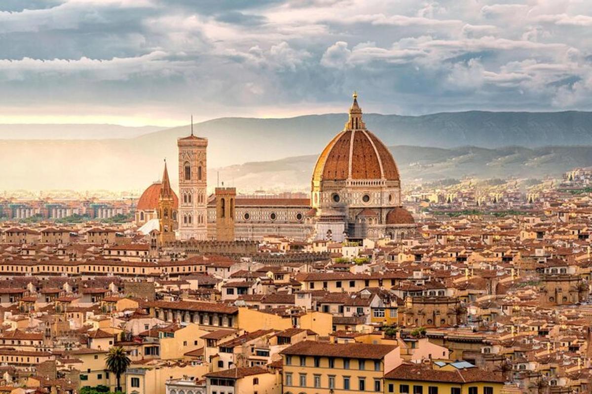 a view of a city with a cathedral and buildings