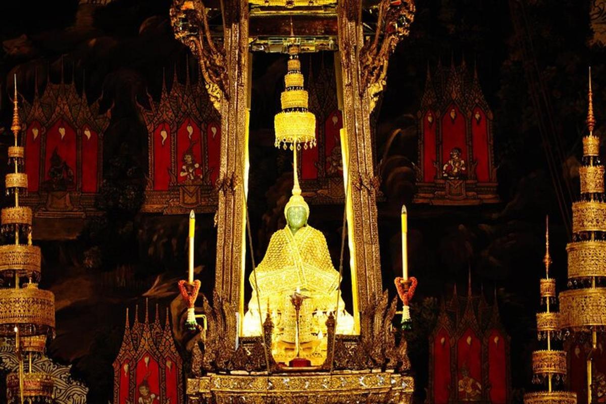 a large chandelier with two candles in a room