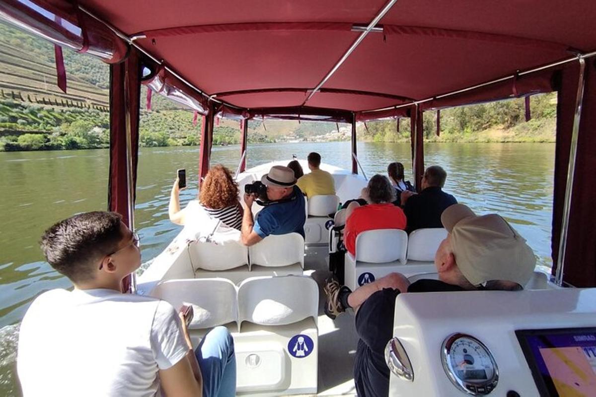 a group of people on a boat on the water